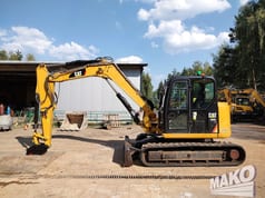 2015 Caterpillar 308E2CR crawler excavator side view 2015 Caterpillar 308E2CR crawler excavator side view