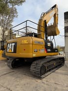 2025 Caterpillar 323D2L crawler excavator, rear three-quarter view 2025 Caterpillar 323D2L crawler excavator, rear three-quarter view
