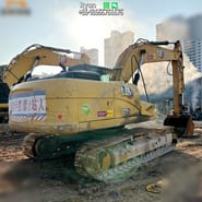 2024 Caterpillar 323GX crawler excavator, rear three-quarter view