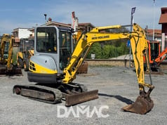 2006 New Holland E352SR mini excavator, side view 2006 New Holland E352SR mini excavator, side view