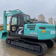 2011 Kobelco SK140LC crawler excavator, rear three-quarter view 2011 Kobelco SK140LC crawler excavator, rear three-quarter view