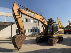 2014 Caterpillar 320BL crawler excavator, side view