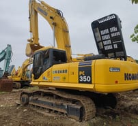 Komatsu PC350 crawler excavator, rear three-quarter view Komatsu PC350 crawler excavator, rear three-quarter view