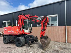 2004 Atlas 1404 MK wheel excavator side view