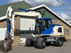 2015 Liebherr A914 wheel excavator, side profile view 2015 Liebherr A914 wheel excavator, side profile view