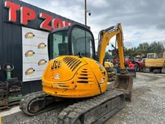 2010 JCB 8055 mini excavator rear three-quarter view 2010 JCB 8055 mini excavator rear three-quarter view