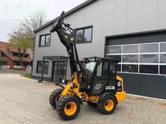 2022 JCB 403 Smart Power High Lift wheel loader, front three-quarter view 2022 JCB 403 Smart Power High Lift wheel loader, front three-quarter view