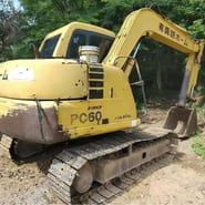 Komatsu PC60 crawler excavator, rear three-quarter view Komatsu PC60 crawler excavator, rear three-quarter view