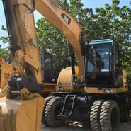 2019 Caterpillar M315D wheel excavator, front three-quarter view 2019 Caterpillar M315D wheel excavator, front three-quarter view