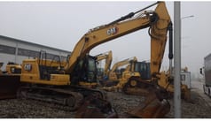 2021 Caterpillar 320-07 crawler excavator, side profile view