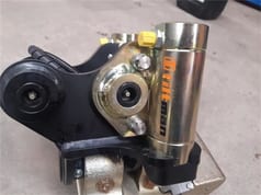 Tiltman mini excavator tilt rotator attachment close-up