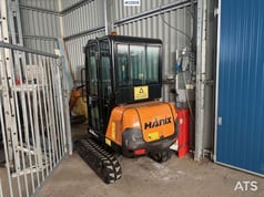 2011 Hanix H15B mini excavator, rear three-quarter view