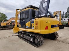 2014 Komatsu PC130 crawler excavator, rear three-quarter view