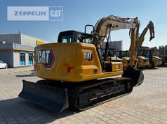 2021 Caterpillar 313-07B crawler excavator rear three-quarter view