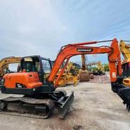 2022 Doosan DX60 crawler excavator, side view 2022 Doosan DX60 crawler excavator, side view