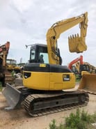 2002 Komatsu PC78US crawler excavator, rear three-quarter view