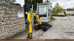 2015 Wacker Neuson 1404 mini excavator, front three-quarter view
