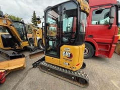 2022 Caterpillar 302 mini excavator, side view 2022 Caterpillar 302 mini excavator, side view