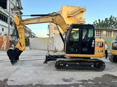 2023 Caterpillar 307E2 mini excavator side view 2023 Caterpillar 307E2 mini excavator side view