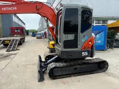 2023 Hitachi Zaxis 55 mini excavator, rear three-quarter view 2023 Hitachi Zaxis 55 mini excavator, rear three-quarter view