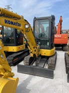 2020 Komatsu PC30MR-3 mini excavator, front three-quarter view