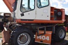 2001 Atlas 1404 M wheel excavator side view