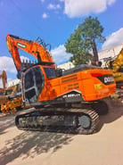 2024 Doosan DX 225 LCA crawler excavator, rear three-quarter view