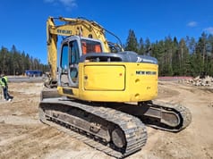 2009 New Holland E235BSR-2 crawler excavator, rear three-quarter view 2009 New Holland E235BSR-2 crawler excavator, rear three-quarter view