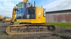 2016 Caterpillar 325F L crawler excavator, rear three-quarter view