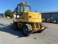 2000 Komatsu PW95R wheel excavator rear three-quarter view