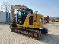 2021 Caterpillar 315GC crawler excavator, rear three-quarter view