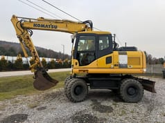 2009 Komatsu PW160-7E0 wheel excavator side view 2009 Komatsu PW160-7E0 wheel excavator side view
