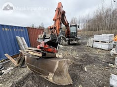 2014 Hitachi ZX140W-5 wheel excavator, front three-quarter view