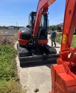 Kubota KX163 mini excavator rear view