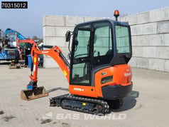 2023 Kubota KX016-4 mini excavator, rear three-quarter view
