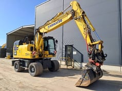 2023 Komatsu PW180-11E0 wheel excavator, side view 2023 Komatsu PW180-11E0 wheel excavator, side view
