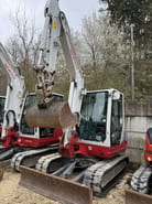 2018 Takeuchi TB250 mini excavator, front three-quarter view