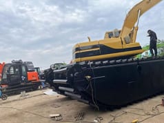 2023 Caterpillar 320BL amphibious excavator, side view