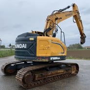 Hyundai 235 crawler excavator, rear three-quarter view