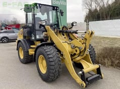 2023 Caterpillar 908 wheel loader, front three-quarter view 2023 Caterpillar 908 wheel loader, front three-quarter view