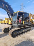 2024 Hyundai 210-9 crawler excavator, side view of the cab and tracks