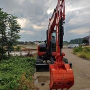 Kubota KX163-5 mini excavator, front view Kubota KX163-5 mini excavator, front view
