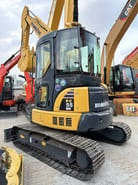 2020 Komatsu PC55MR-2 mini excavator, rear three-quarter view 2020 Komatsu PC55MR-2 mini excavator, rear three-quarter view