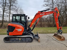 2023 Kubota KX060-5 mini excavator, side view