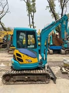 2022 Kubota U-25 mini excavator, side view 2022 Kubota U-25 mini excavator, side view