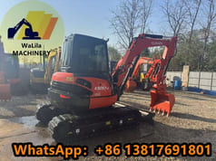 2024 Kubota KX057-4 mini excavator, front three-quarter view