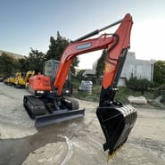 2022 Doosan DX60 mini excavator, front three-quarter view 2022 Doosan DX60 mini excavator, front three-quarter view
