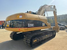 2019 Caterpillar 320CL crawler excavator, rear three-quarter view