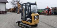 2016 Caterpillar 301.7D crawler excavator, rear three-quarter view