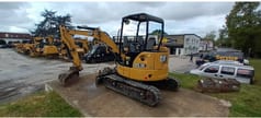 2020 Caterpillar 303.5E CR crawler excavator, rear three-quarter view